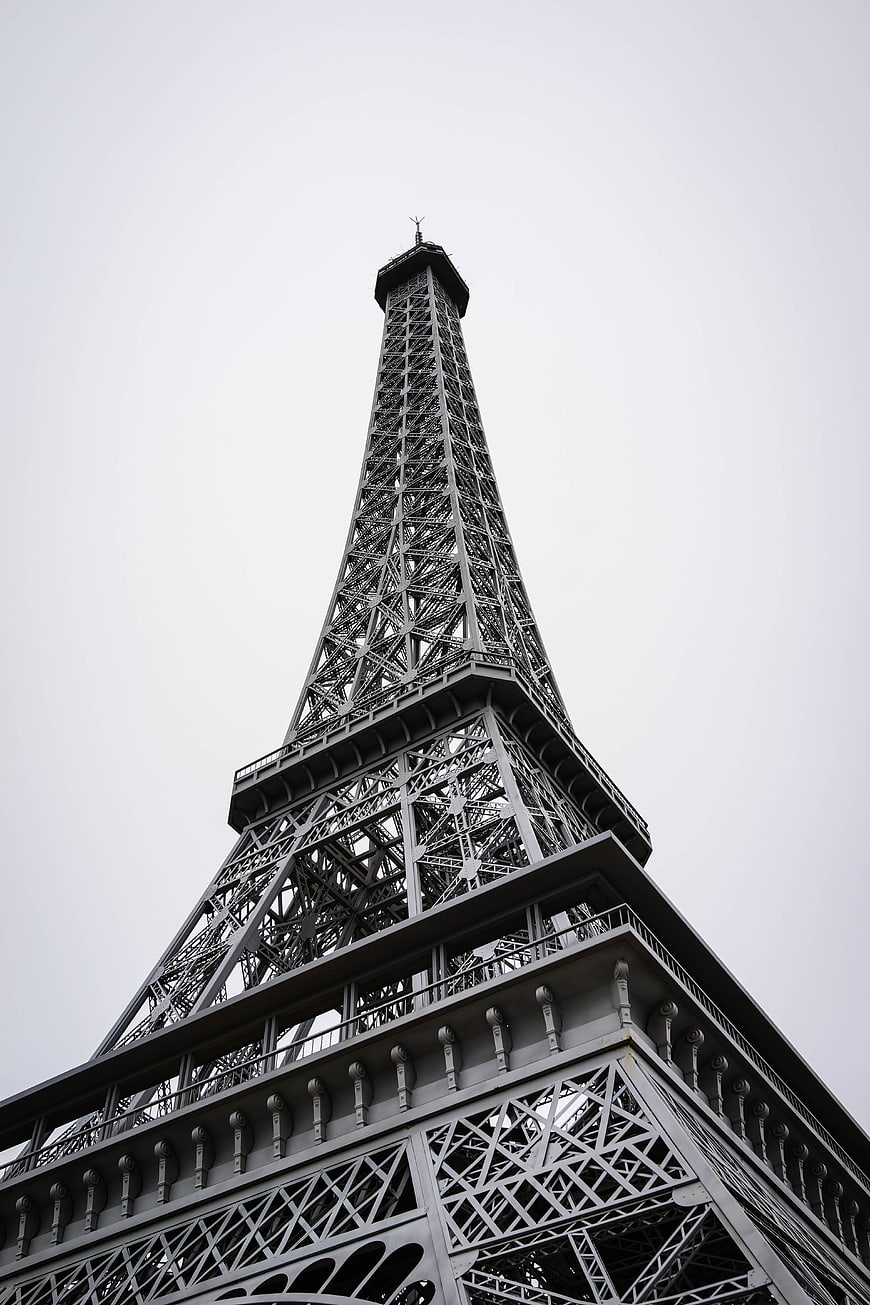 Low Angle View of Eiffel Tower Against Overcast Sky