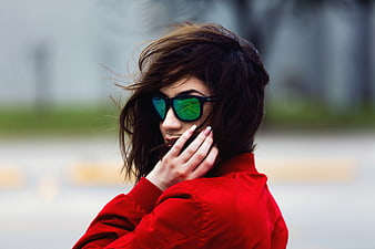 Woman in Red Jacket with Green Sunglasses