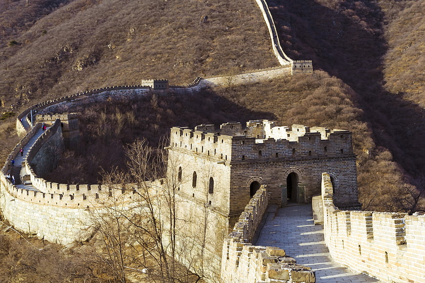 Great Wall of China winding through mountains in winter