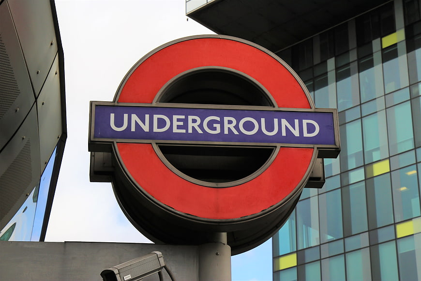 London Underground Sign with Modern Building Background