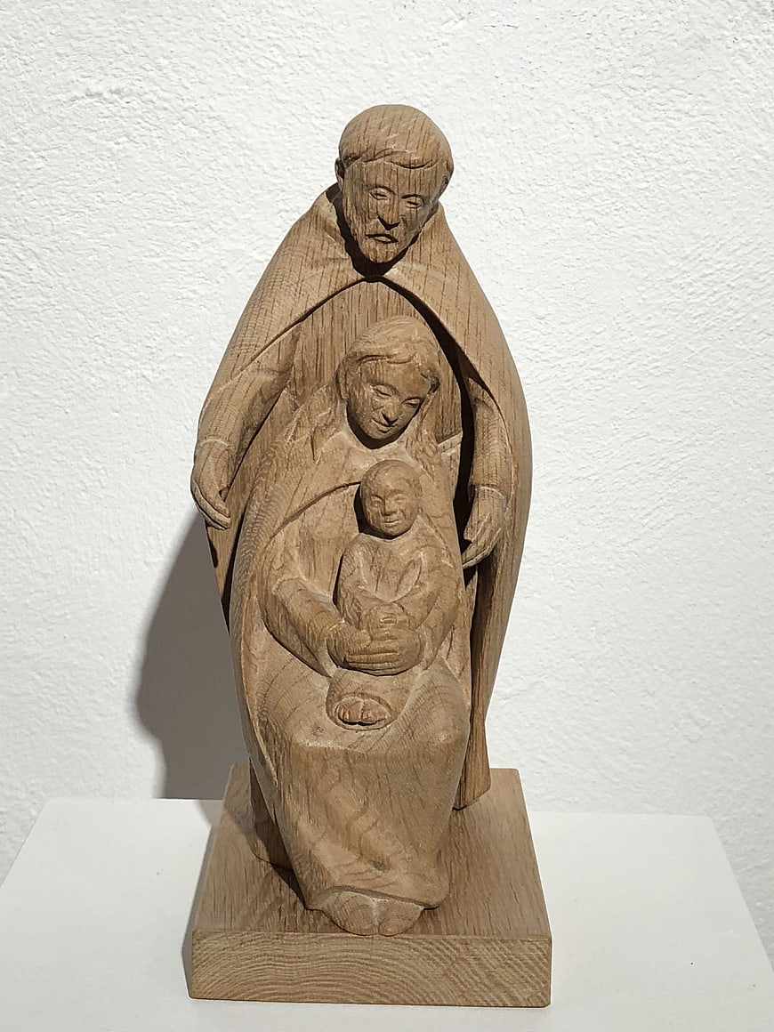 Wooden Holy Family Sculpture on White Pedestal
