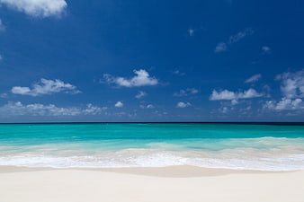Tropical Beach Landscape With Turquoise Water And Blue Sky