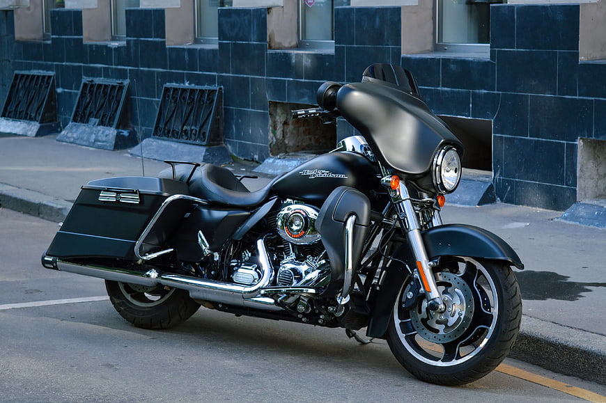 Black Harley-Davidson Motorcycle Parked on City Street