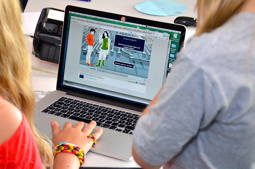 Students Using Laptop For Media Literacy Education In Classroom