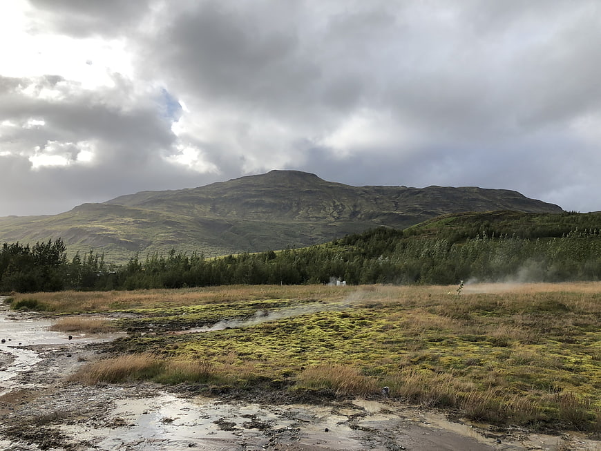 Icelandic Geothermal Landscape with Mountain and Steam