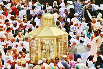 Golden Maqam Ibrahim surrounded by Muslim pilgrims in Mecca