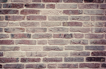 Textured Old Brick Wall Background with Weathered Stones