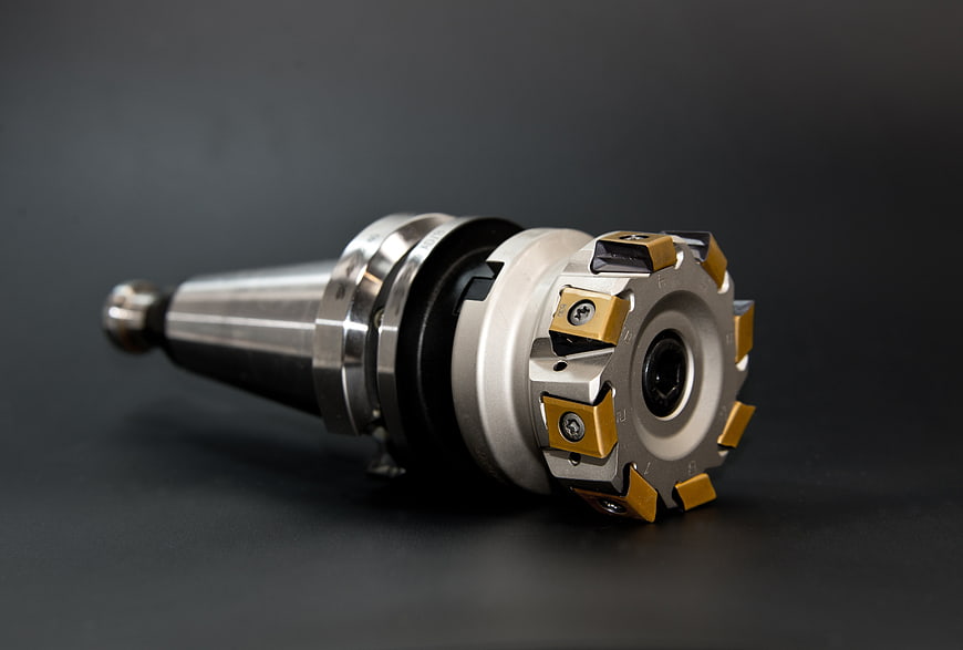 CNC milling cutter tool on dark background