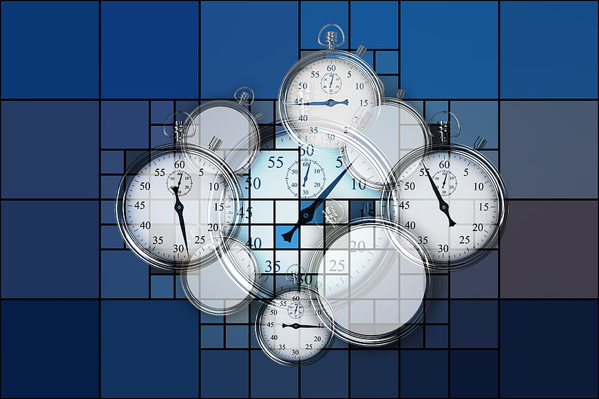 Abstract Stopwatch Cluster On Blue Grid Background