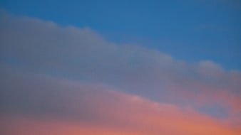 Soft Pink and Blue Sunset Clouds Sky Background