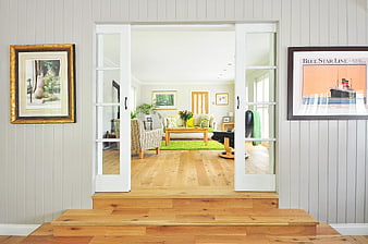 Bright living room interior with hardwood floors and french doors