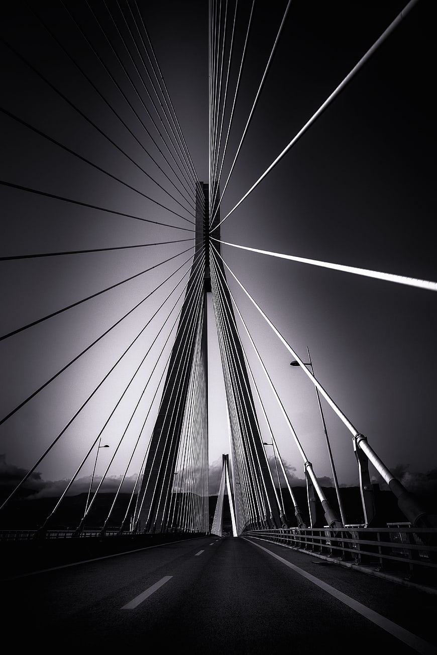 Dramatic Black and White View of Rio-Antirrio Suspension Bridge