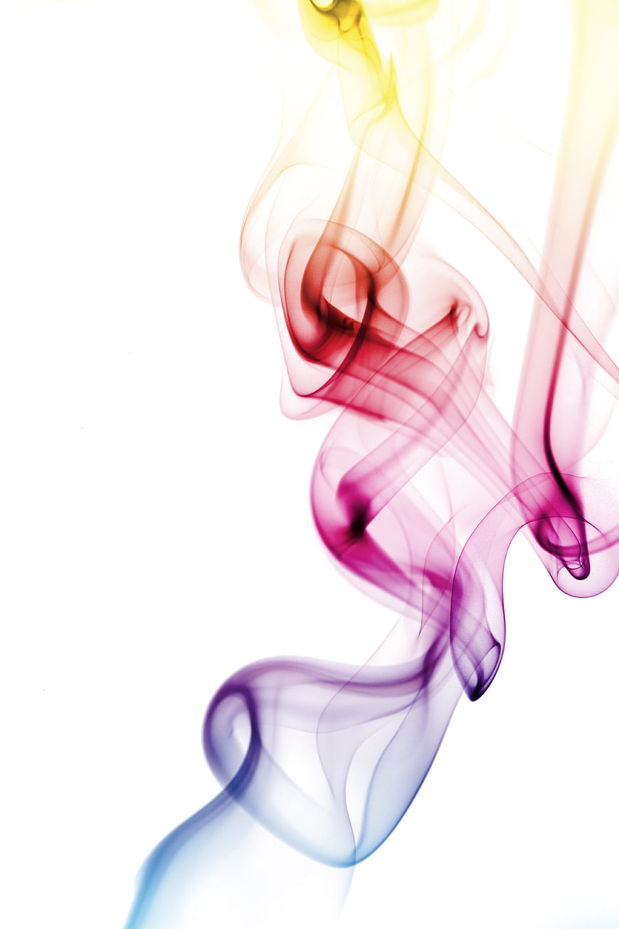 Abstract colorful smoke swirls on white background