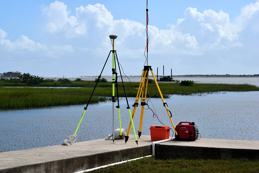 Surveying Equipment on Concrete Pier by Water