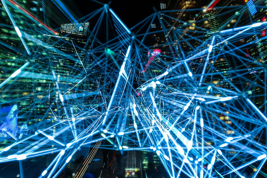 Abstract Blue Laser Network Over City Skyline