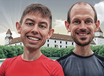 Caricature portraits of two smiling men with castle background