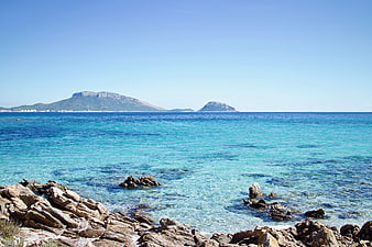 Sardinia Coastal Landscape With Turquoise Sea And Rocky Shore
