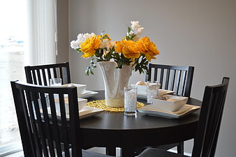 Elegant Dining Table Setting with Yellow Peonies