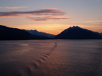 Serene Sunset Over Glacier Bay Mountains and Ocean