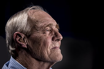 Elderly Man Profile Portrait With Hearing Aid