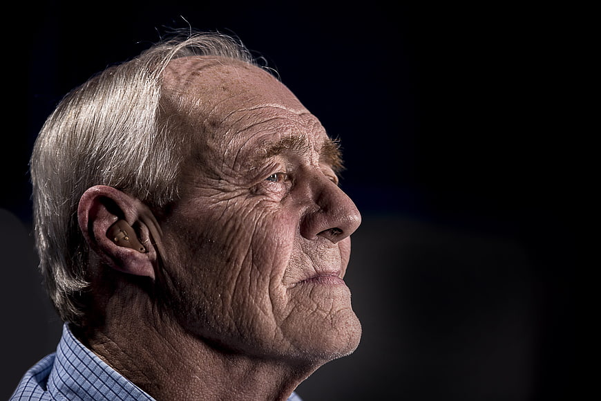 Elderly Man Profile Portrait With Hearing Aid