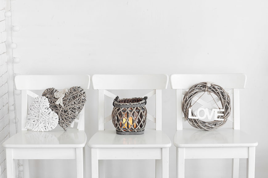 White Chairs with Rustic Decor and Love Wreath