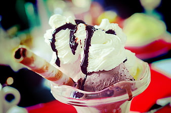 Chocolate Ice Cream Sundae With Whipped Cream And Chocolate Syrup