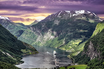 Norwegian Fjord Landscape With Cruise Ships And Snow-Capped Mountains