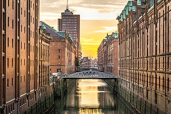 Sunset Reflection on Hamburg Speicherstadt Canal with Brick Warehouses