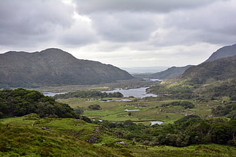 Scenic Green Valley Landscape With Lakes And Mountains In Ireland