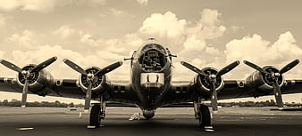 Front view of vintage B-17 bomber on runway