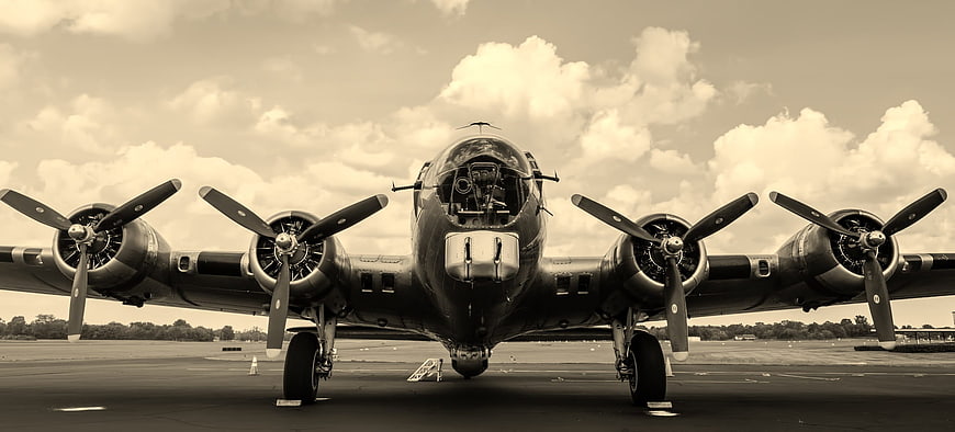 Front view of vintage B-17 bomber on runway