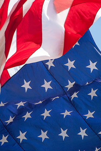 Close-up of waving American flag with stars and stripes