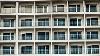Modern Apartment Building Facade with Repeating Balconies