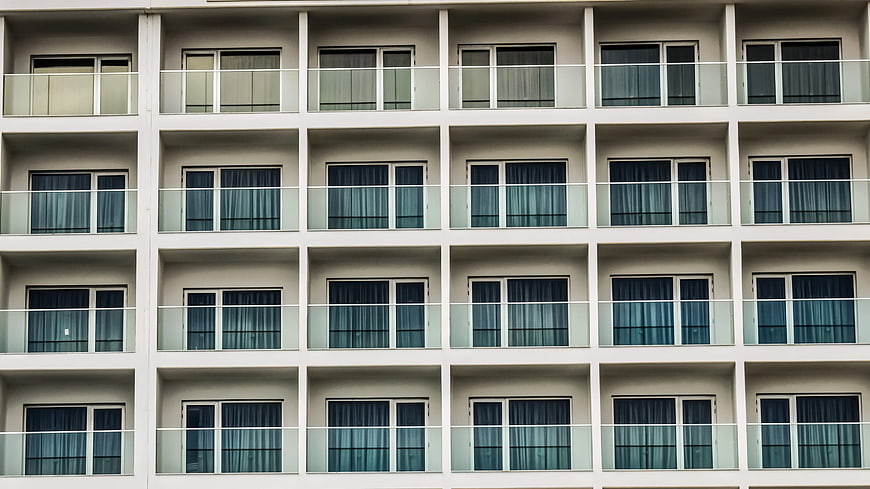 Modern Apartment Building Facade with Repeating Balconies