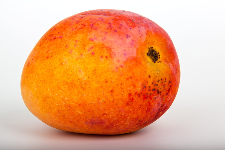Ripe Red and Orange Mango Isolated on White Background
