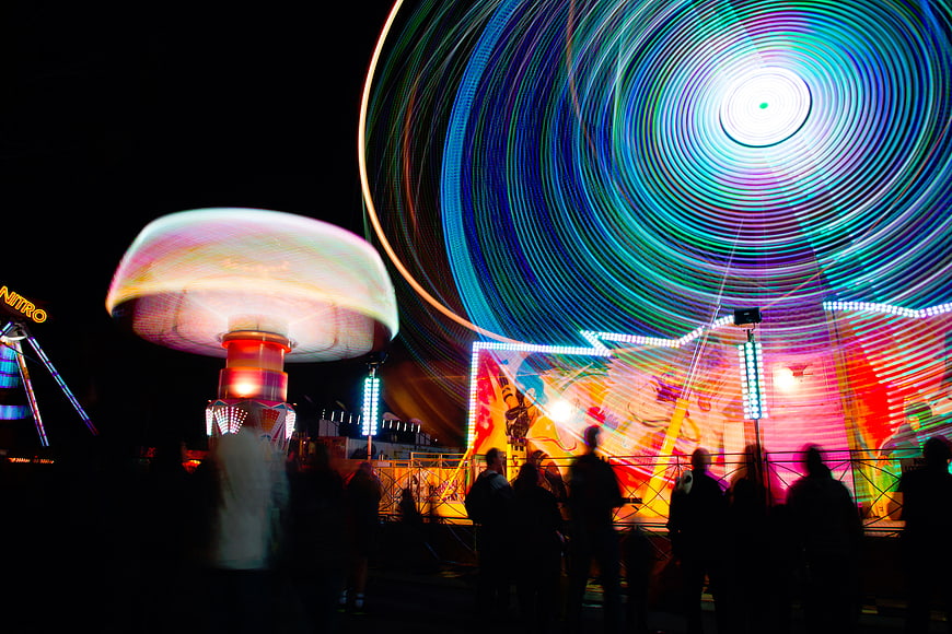 Long Exposure Carnival Lights and Ferris Wheel at Night
