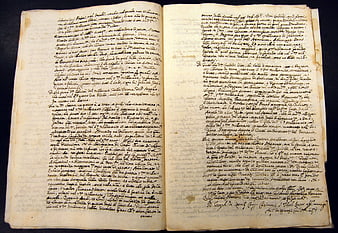 Open Pages of Ancient Italian Manuscript with Cursive Ink Writing