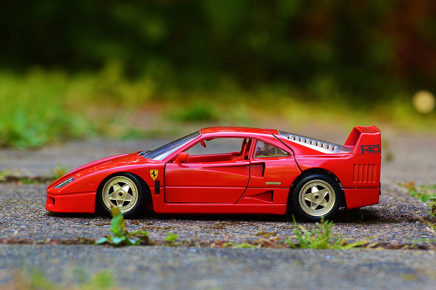 Red Ferrari F40 Model Car on Asphalt