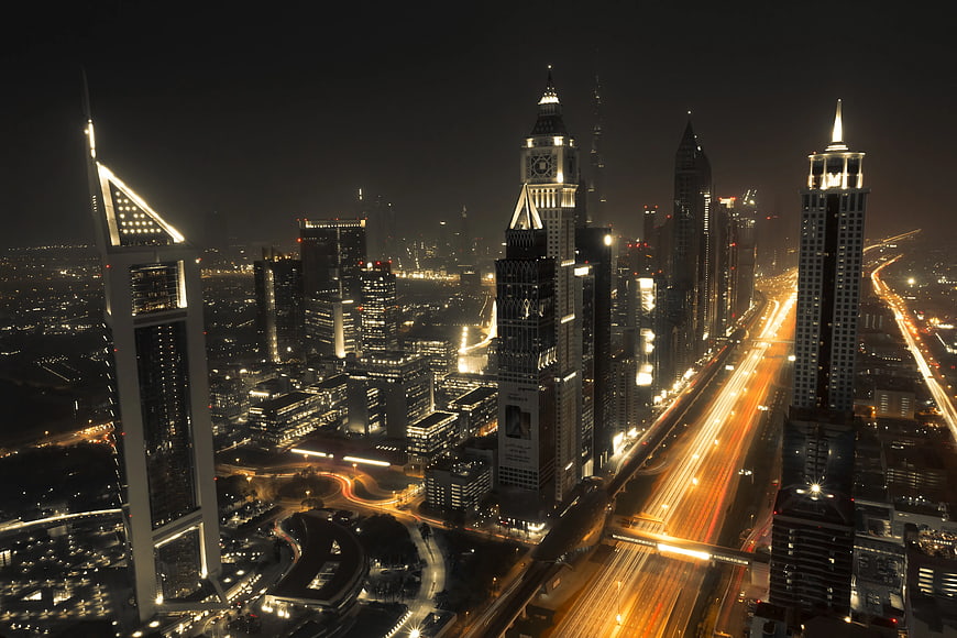 Night Time Lapse of Dubai Skyline and Highway Traffic