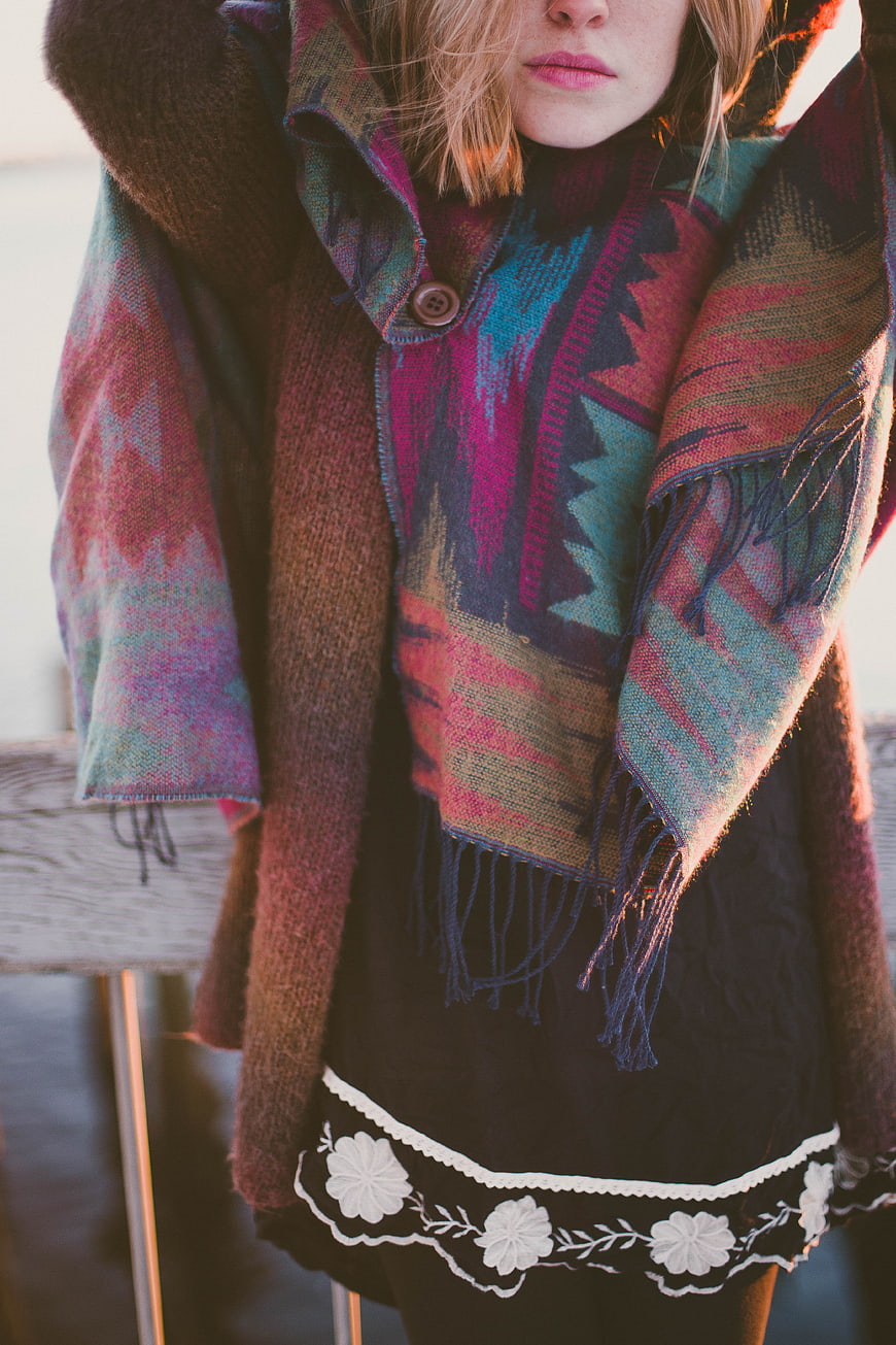 Woman Wearing Colorful Patterned Shawl and Knit Cardigan