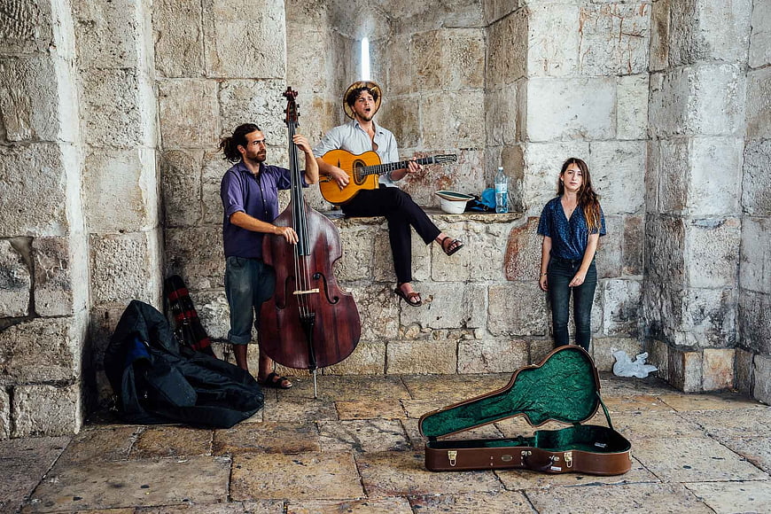 Street Musicians Playing in Ancient Stone Ruins