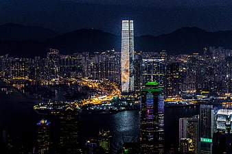 Hong Kong Night Skyline Panoramic View with Illuminated Skyscrapers