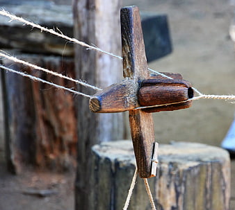 Close-up of traditional wooden rope twisting tool