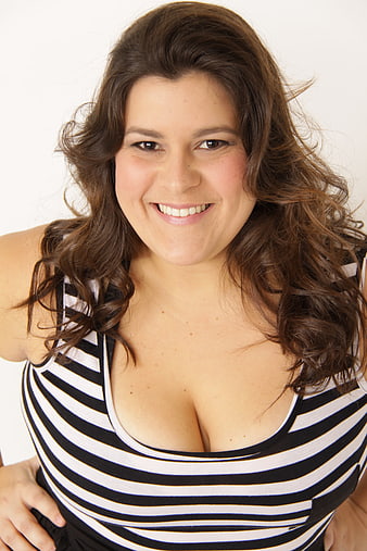 Smiling Plus Size Woman Portrait In Black And White Striped Top