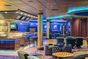 Luxurious Cruise Ship Lounge Interior With Neon Lighting And Velvet Seating