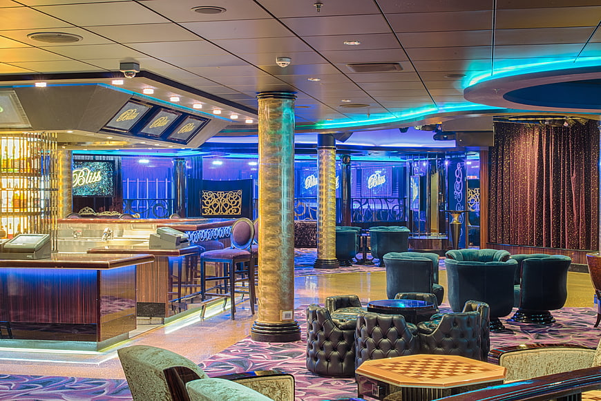Luxurious Cruise Ship Lounge Interior With Neon Lighting And Velvet Seating