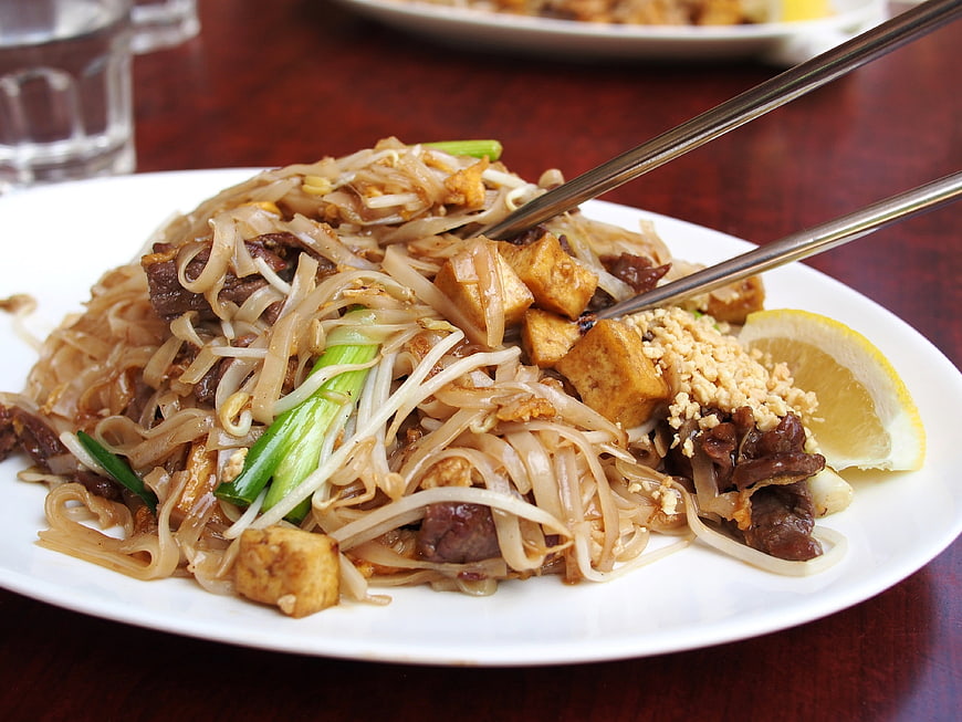 Close-up of Pad Thai with Beef and Tofu on White Plate