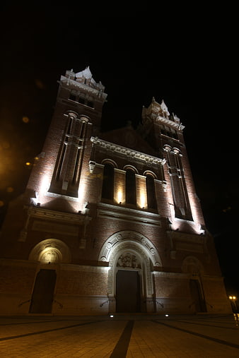 Illuminated Brick Church Architecture at Night