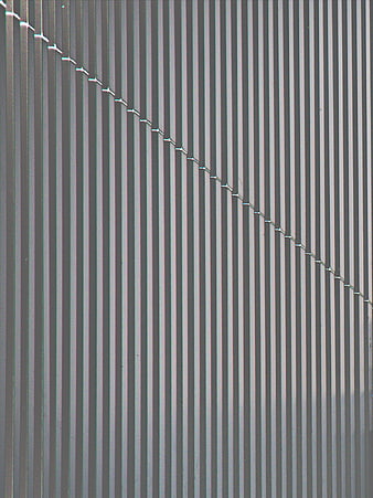 Abstract Vertical Metal Wall Texture with Diagonal Seam